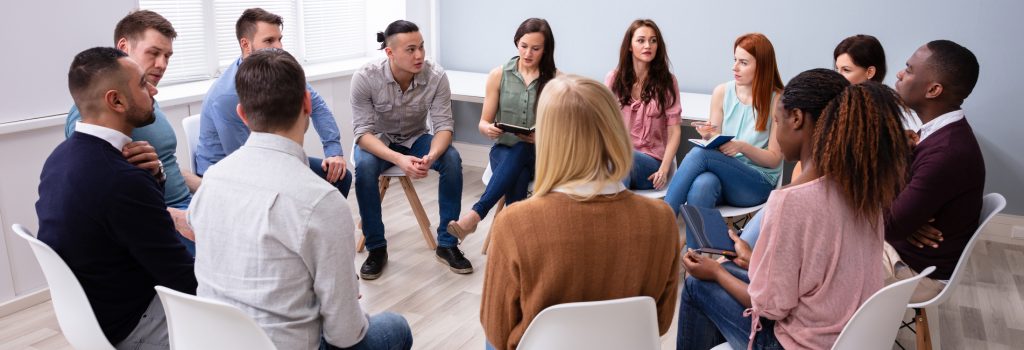 Heroin Addiction Treatment in Sun City Emerald Isle - During their Heroin Addiction Treatment a group meets to discuss their choices while they were addicted to heroin.